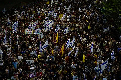 Israel-Hamas war: People attend a rally demanding a cease-fire deal and the immediate release of hostages in Tel Aviv